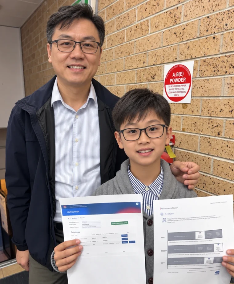 A student and his father at Test Magic